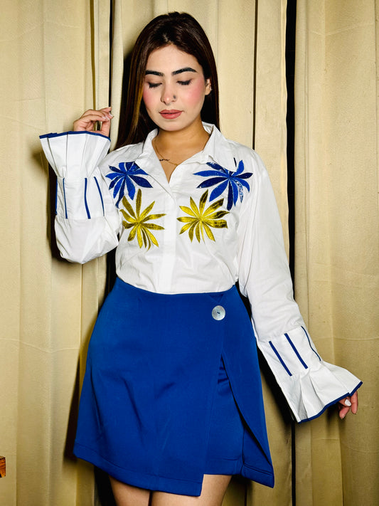 Regal Simplicity: Royal Blue Skorts Paired with White Cotton Shirt Adorned with Embroidery